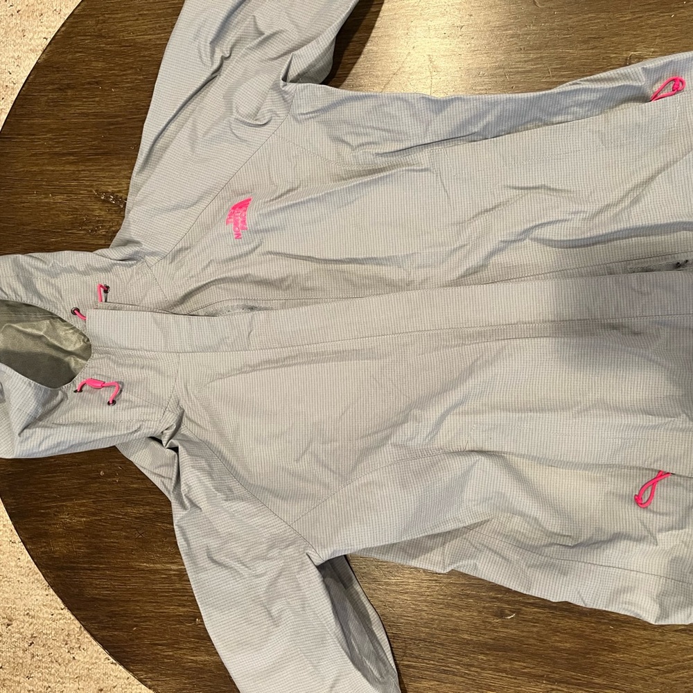 Grey and pink north face rain coat